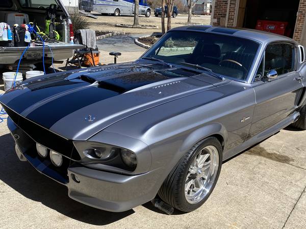 Silver classic Mustang fastback detailed on site